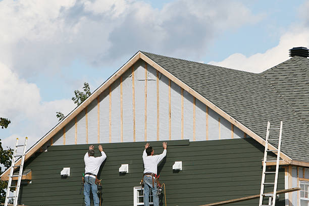 Professional Fiber Cement Siding technician working in College Corner, OH